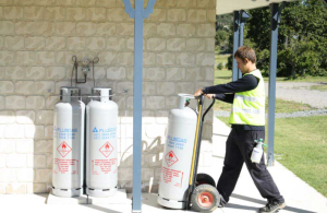 Three Filled Propane Gas Cylinders